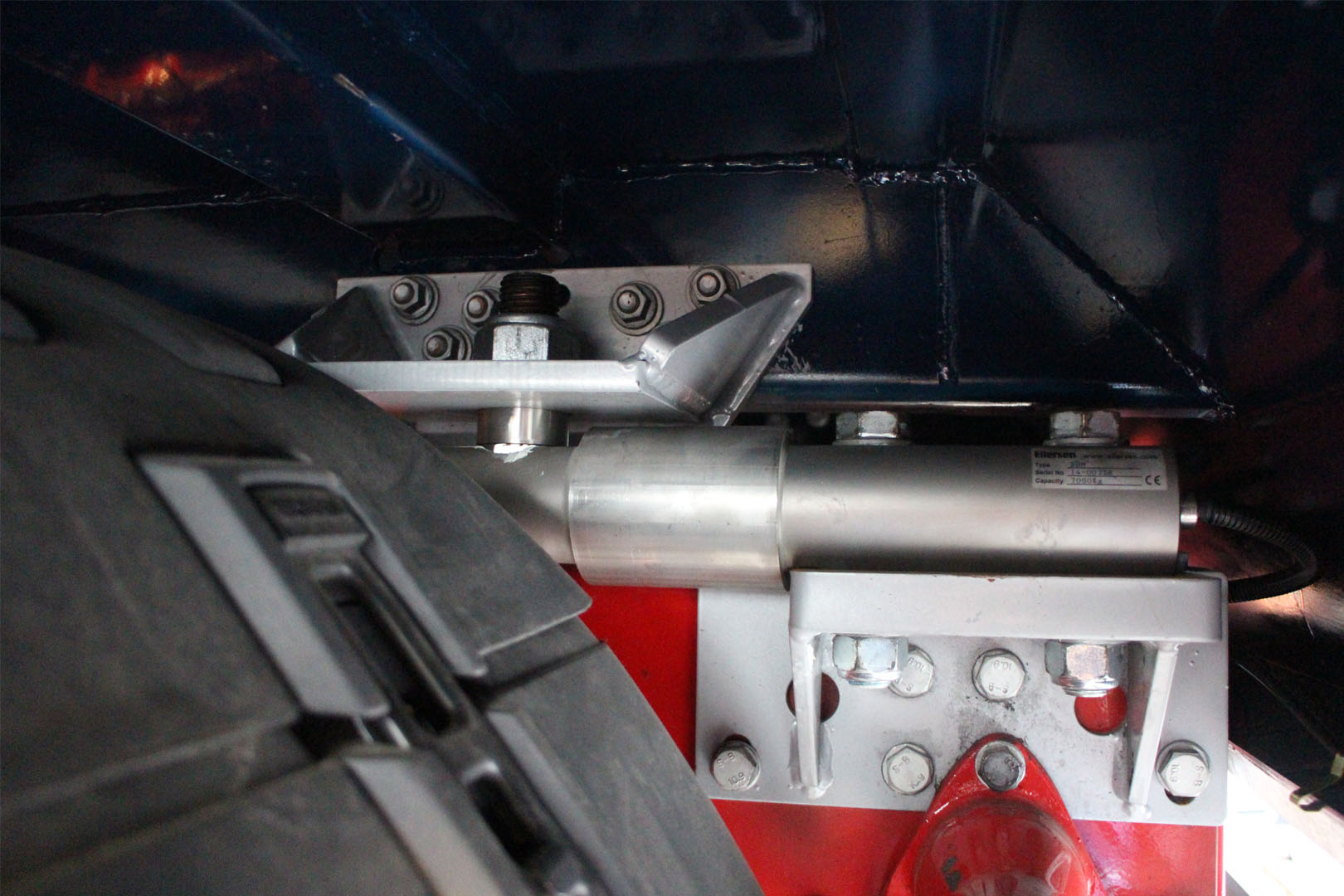 Fixed mounting of Eilersen load cells shown on truck with an Eilersen chassis mounted weighing system