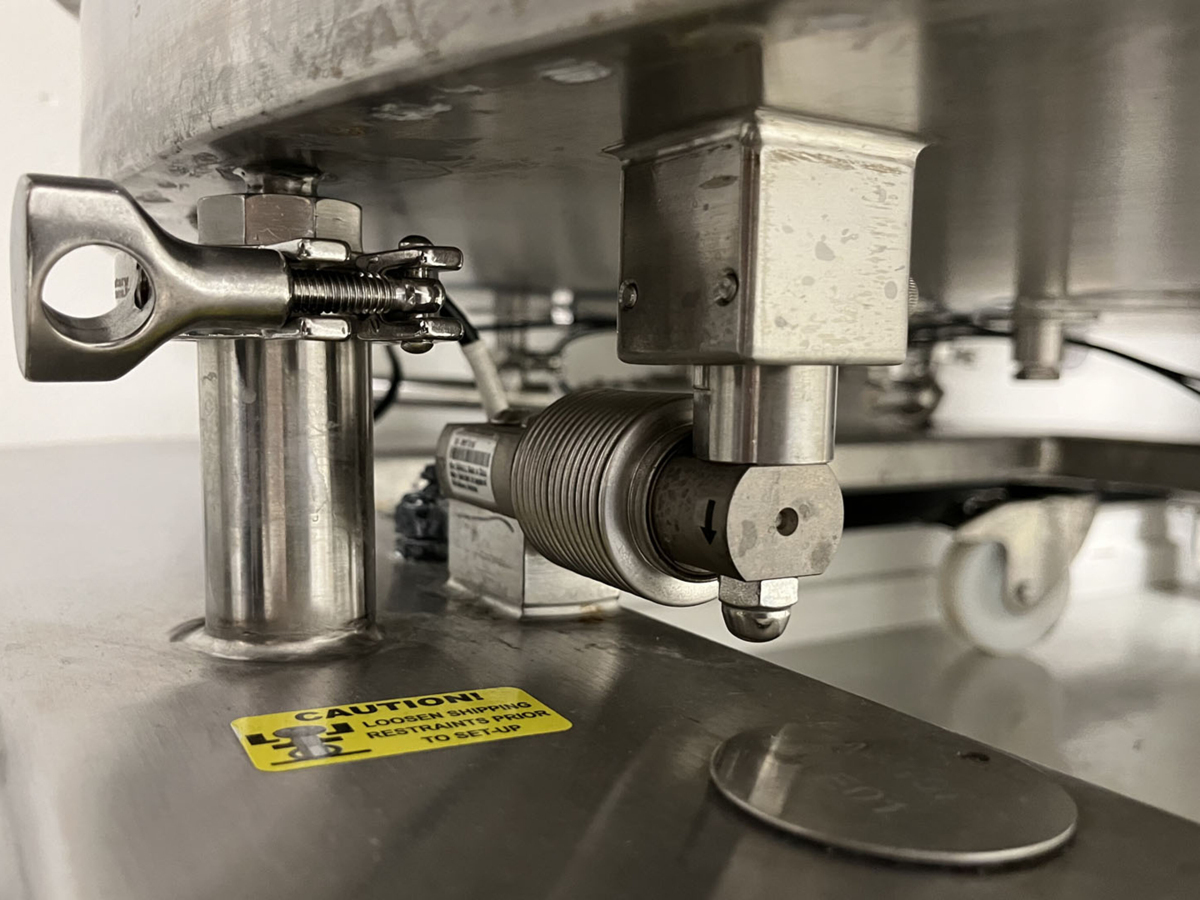 Example of strain gage load cell mounted with transport lock.